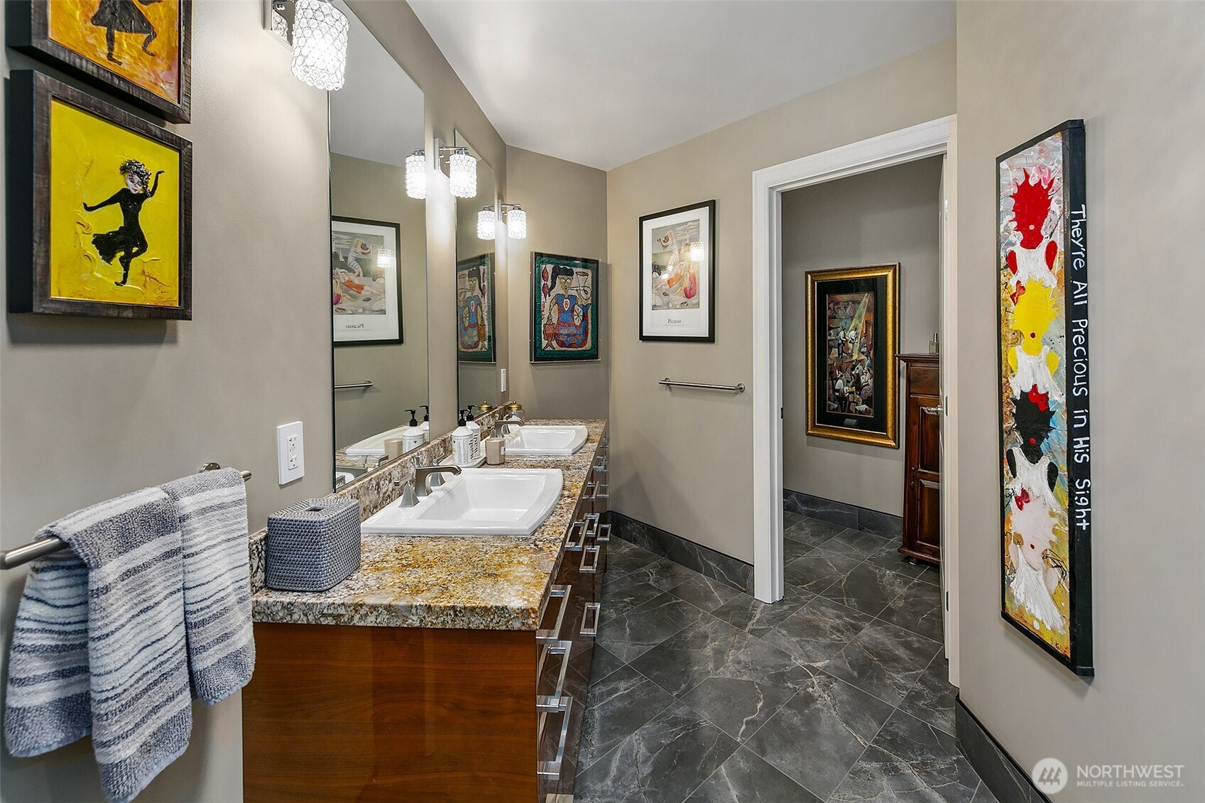 1920 4th Avenue, Unit 2802 Seattle, WA 98101 - Photo 28 of 40 a bathroom with a granite countertop sink and a mirror
