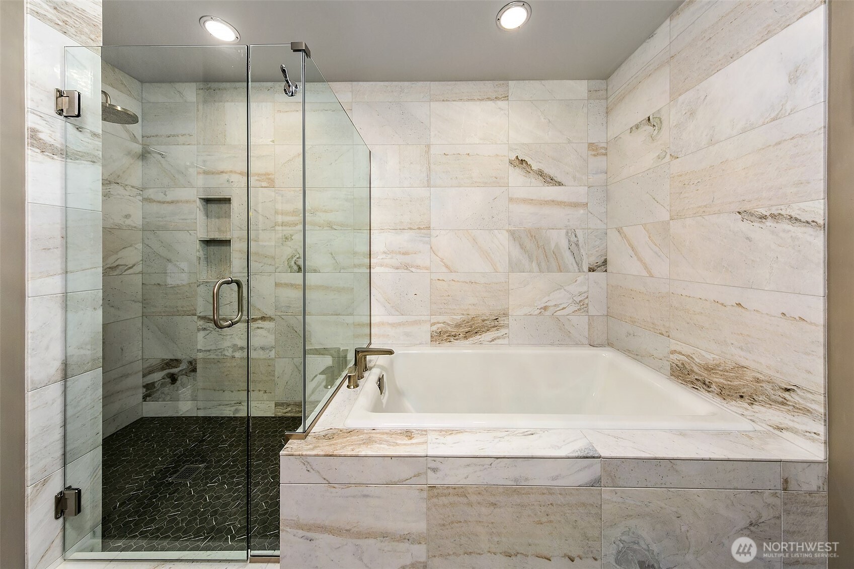 1920 4th Avenue, Unit 2802 Seattle, WA 98101 - Photo 29 of 40 a bathroom with a bathtub and a shower