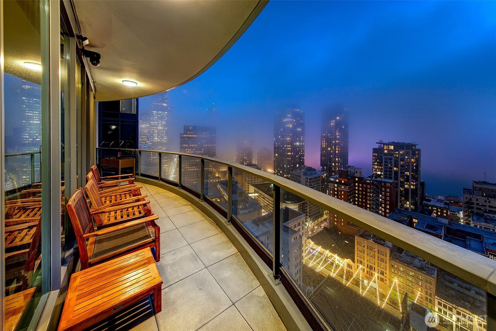 1920 4th Avenue, Unit 2802 Seattle, WA 98101 - Photo 3 of 40 a view of swimming pool with a chairs
