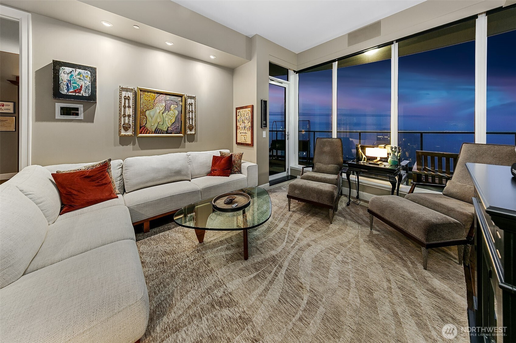1920 4th Avenue, Unit 2802 Seattle, WA 98101 - Photo 10 of 40 a living room with furniture and a fireplace