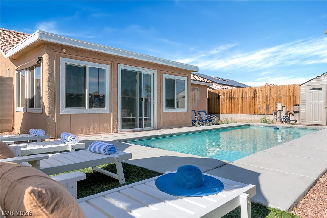 101 Beaver Ridge Avenue North Las Vegas, NV 89031 - Photo 33 of 42 A private swimming oasis awaits, perfect for leisurely afternoons under the open sky.
