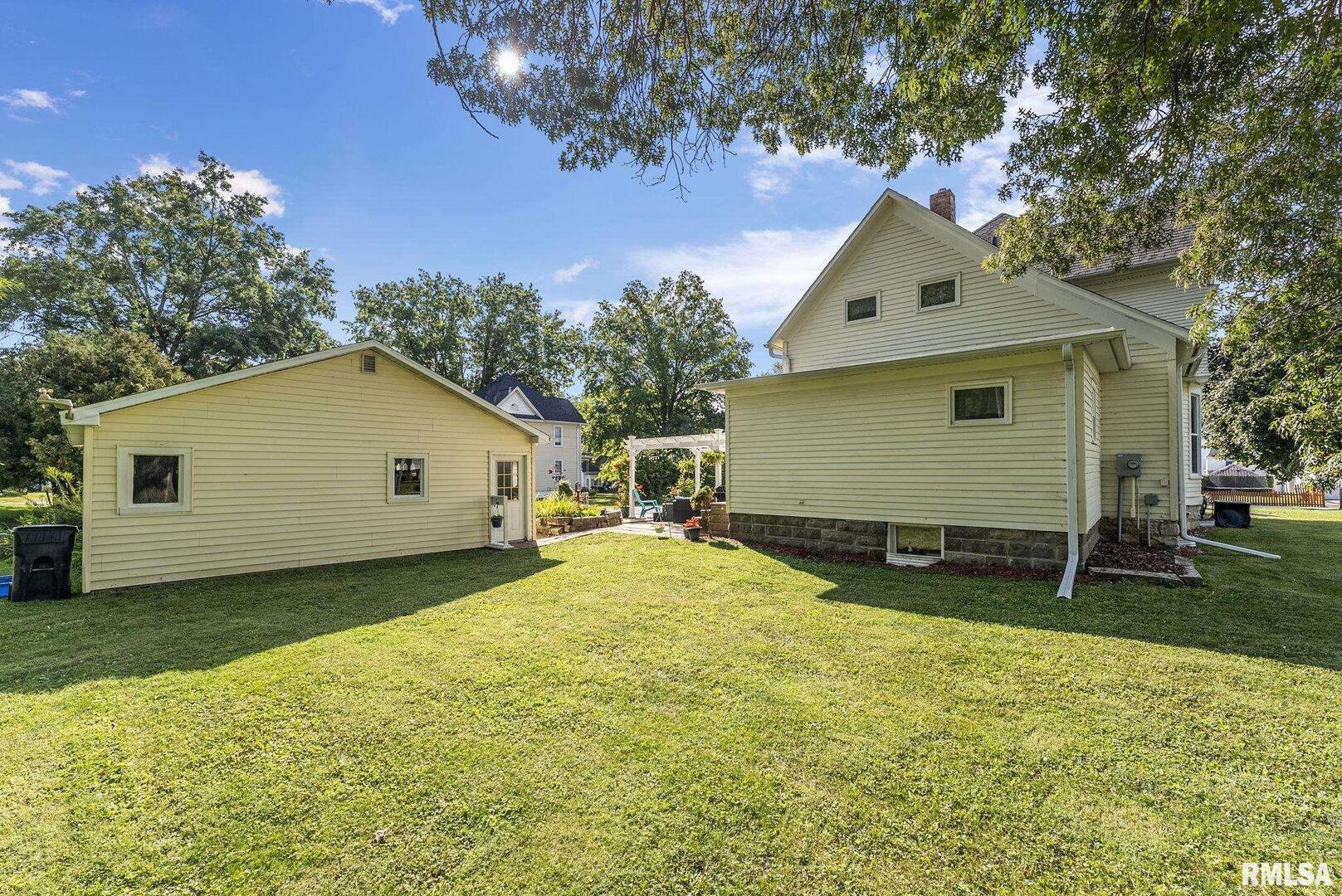 109 West 6th Street Wilton, IA 52778 - Photo 32 of 40 a view of backyard of house
