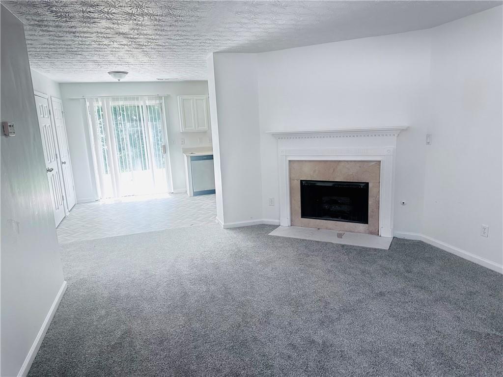 9432 Lakeview Road Union City, GA 30291 - Photo 4 of 11 a view of empty room with a fireplace
