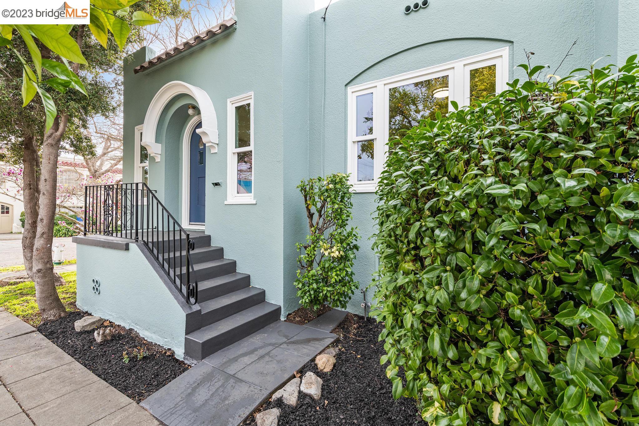 2148 Curtis Street Berkeley, CA 94702 - Photo 1 of 1 a view of a house with a flower garden