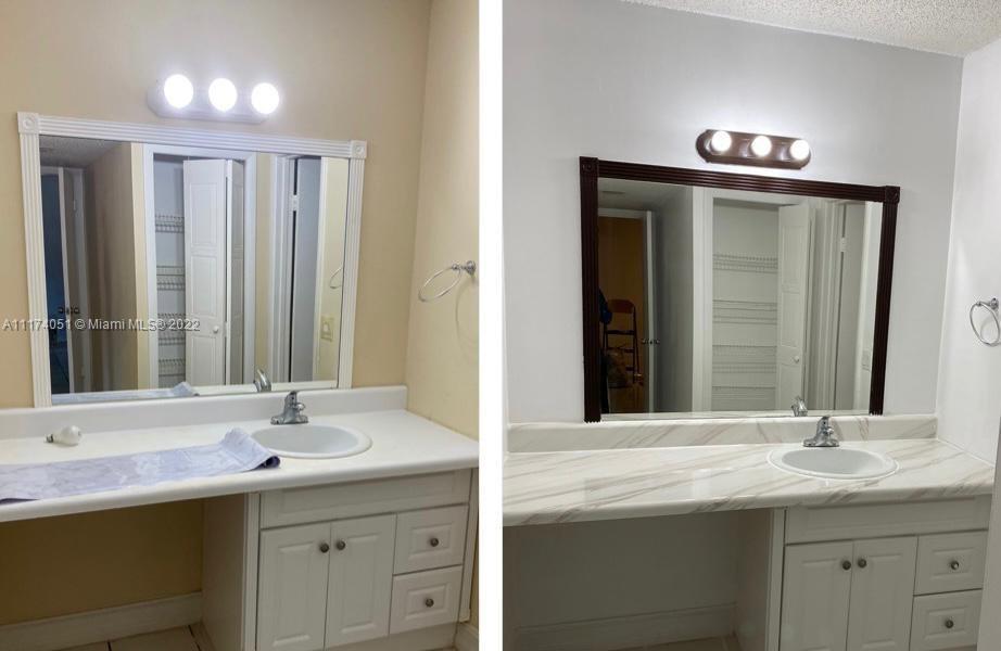 380 Racquet Club Road, Unit 103 Weston, FL 33326 - Photo 11 of 25 a bathroom with a sink and a mirror