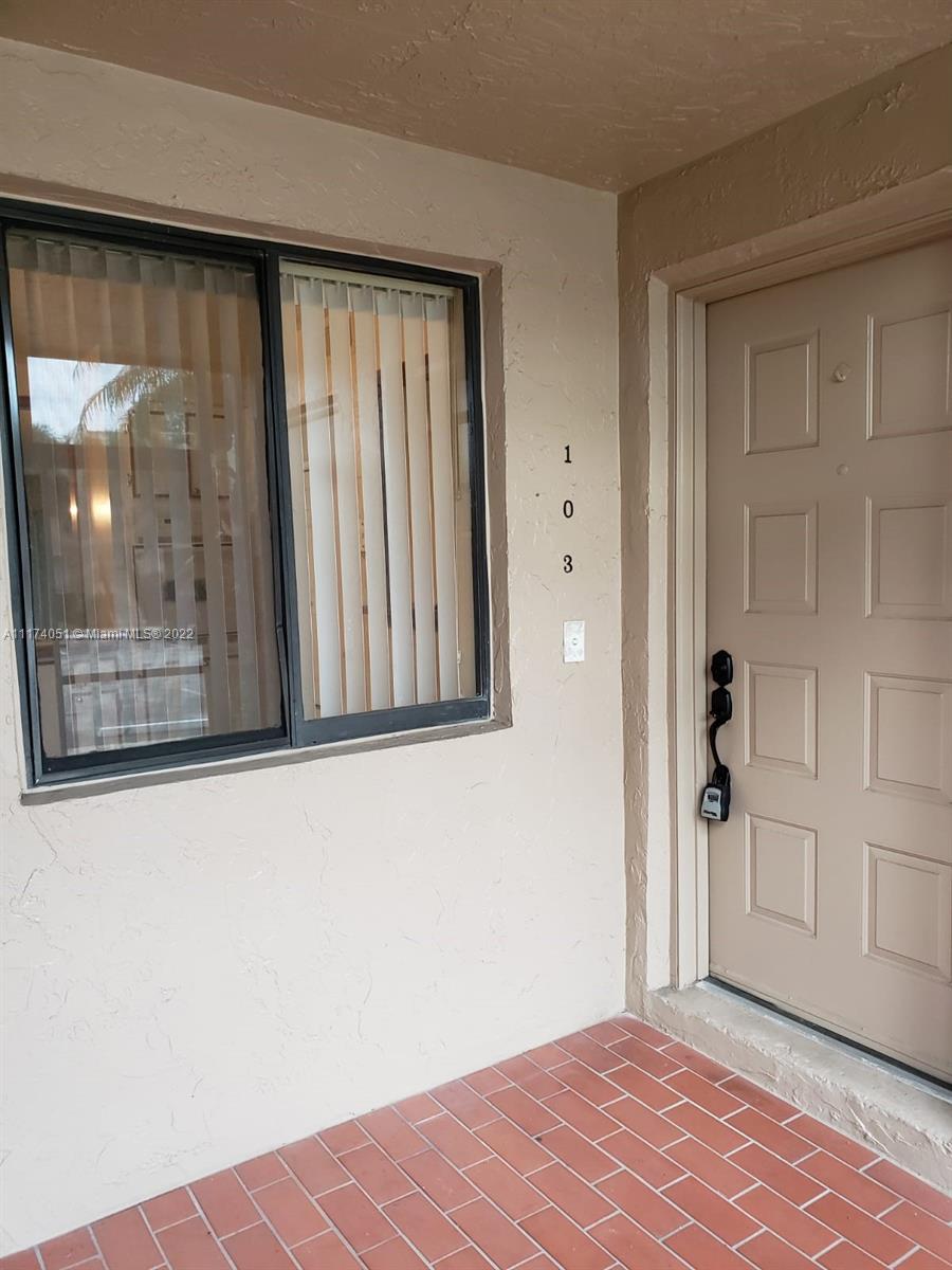 380 Racquet Club Road, Unit 103 Weston, FL 33326 - Photo 5 of 25 a view of a front door of a house