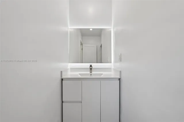 a view of a hallway with windows