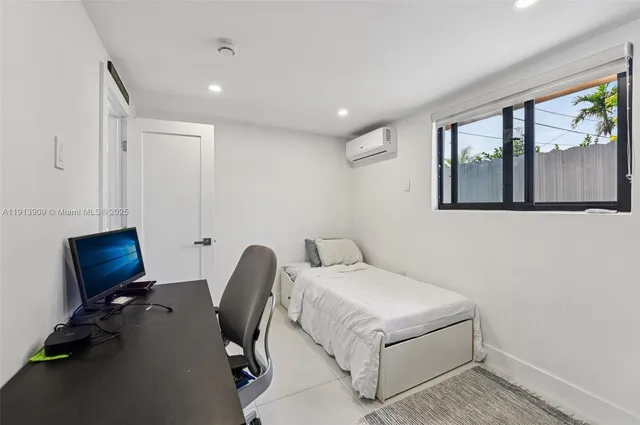 a workspace with furniture and window