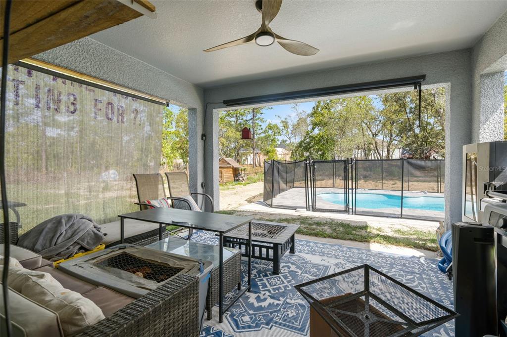 12015 Phoenix Avenue Weeki Wachee, FL 34614 - Photo 29 of 39 a view of a livingroom with furniture