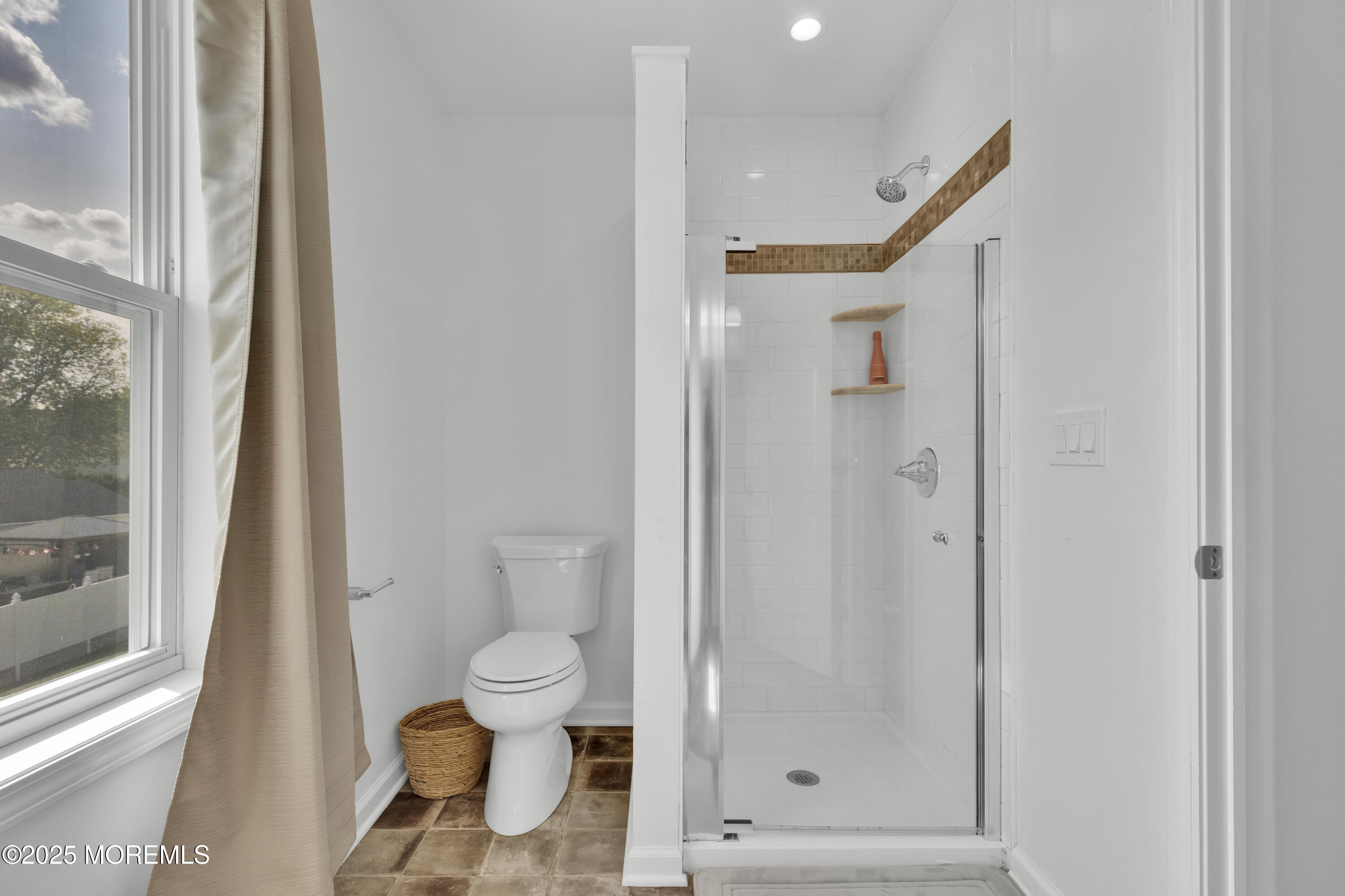 134 County Road Cliffwood, NJ 07721 - Photo 17 of 28 a bathroom with a toilet and a shower