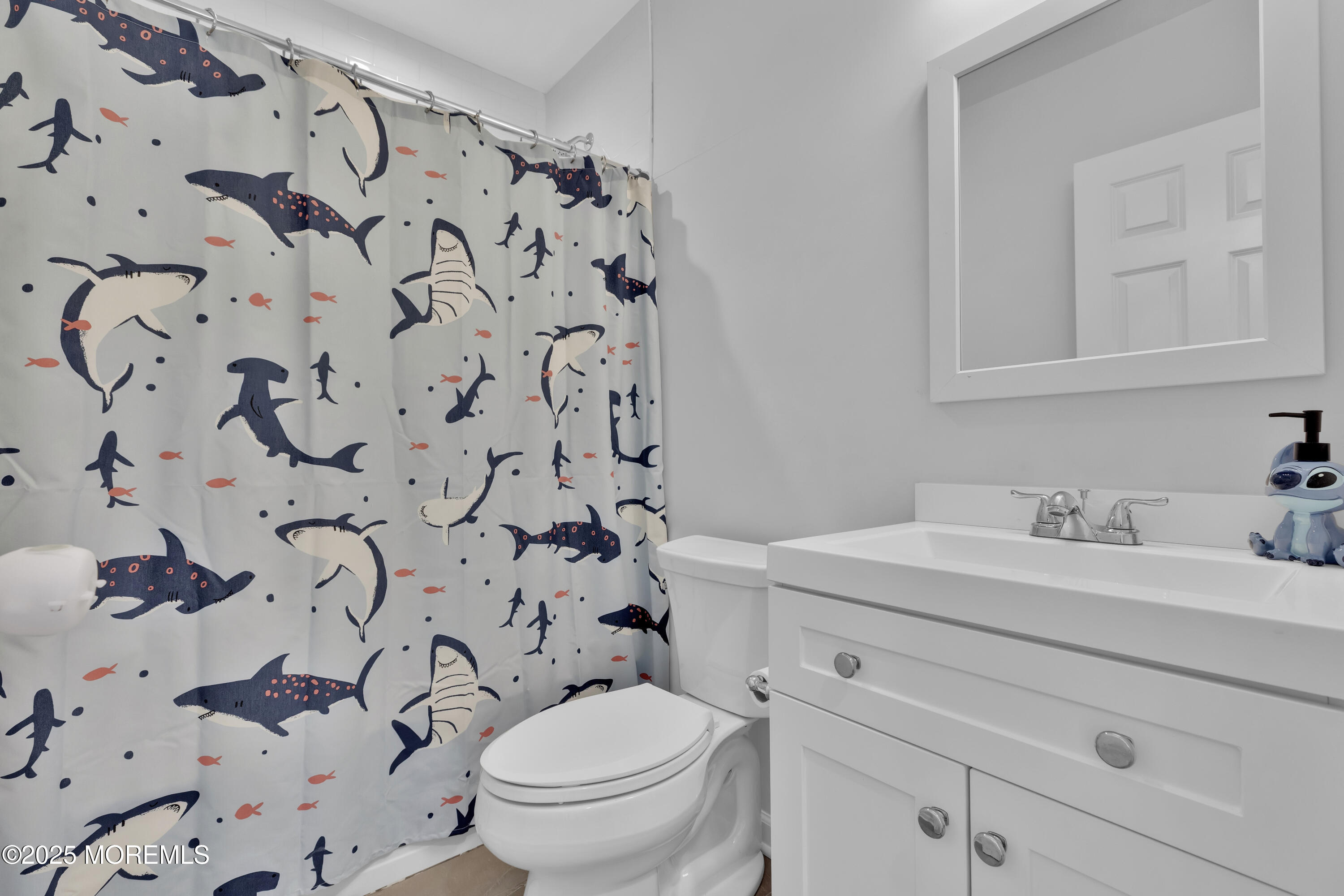 134 County Road Cliffwood, NJ 07721 - Photo 20 of 28 a bathroom with a sink toilet and shower