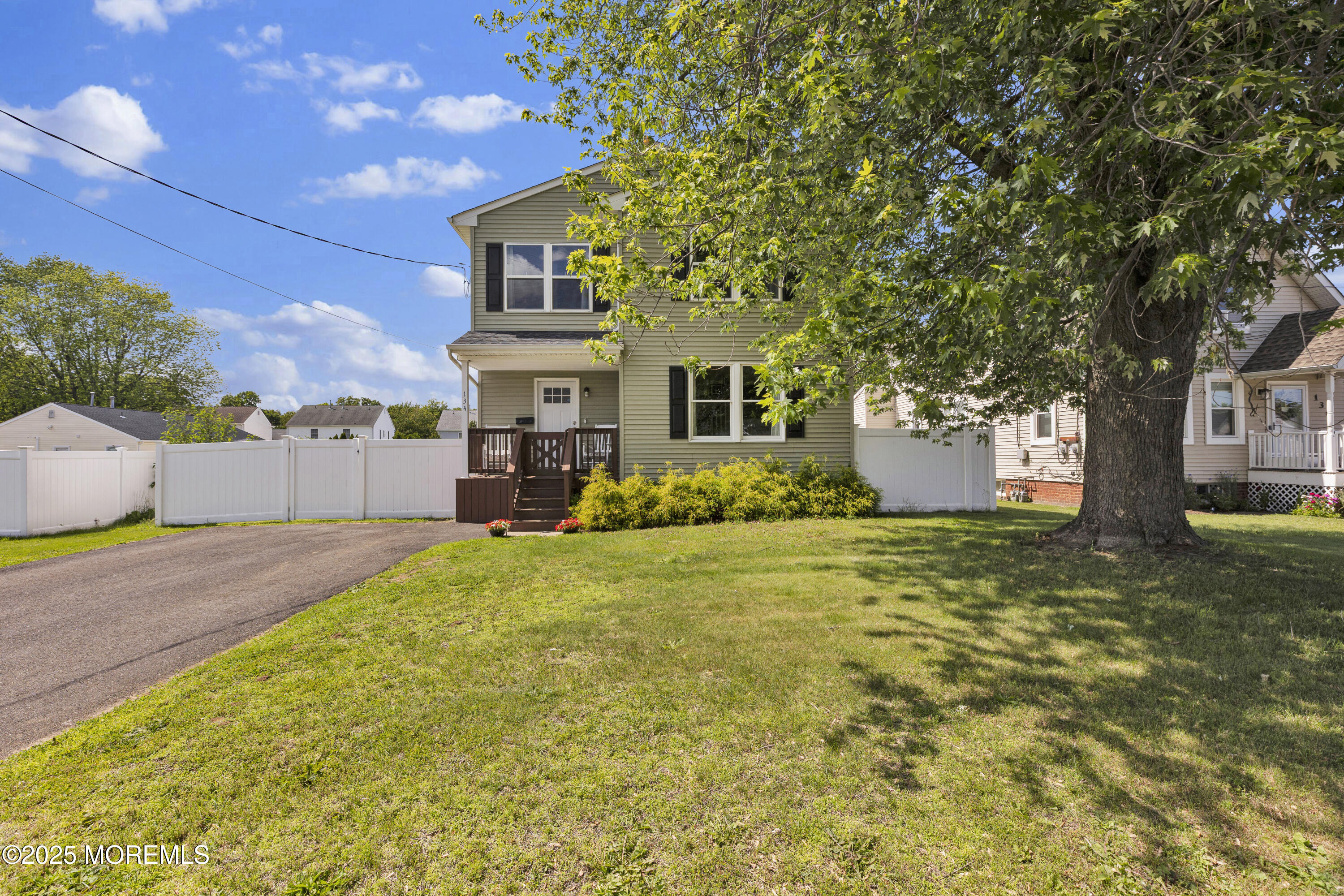 134 County Road Cliffwood, NJ 07721 - Photo 2 of 28 a house view with a garden space