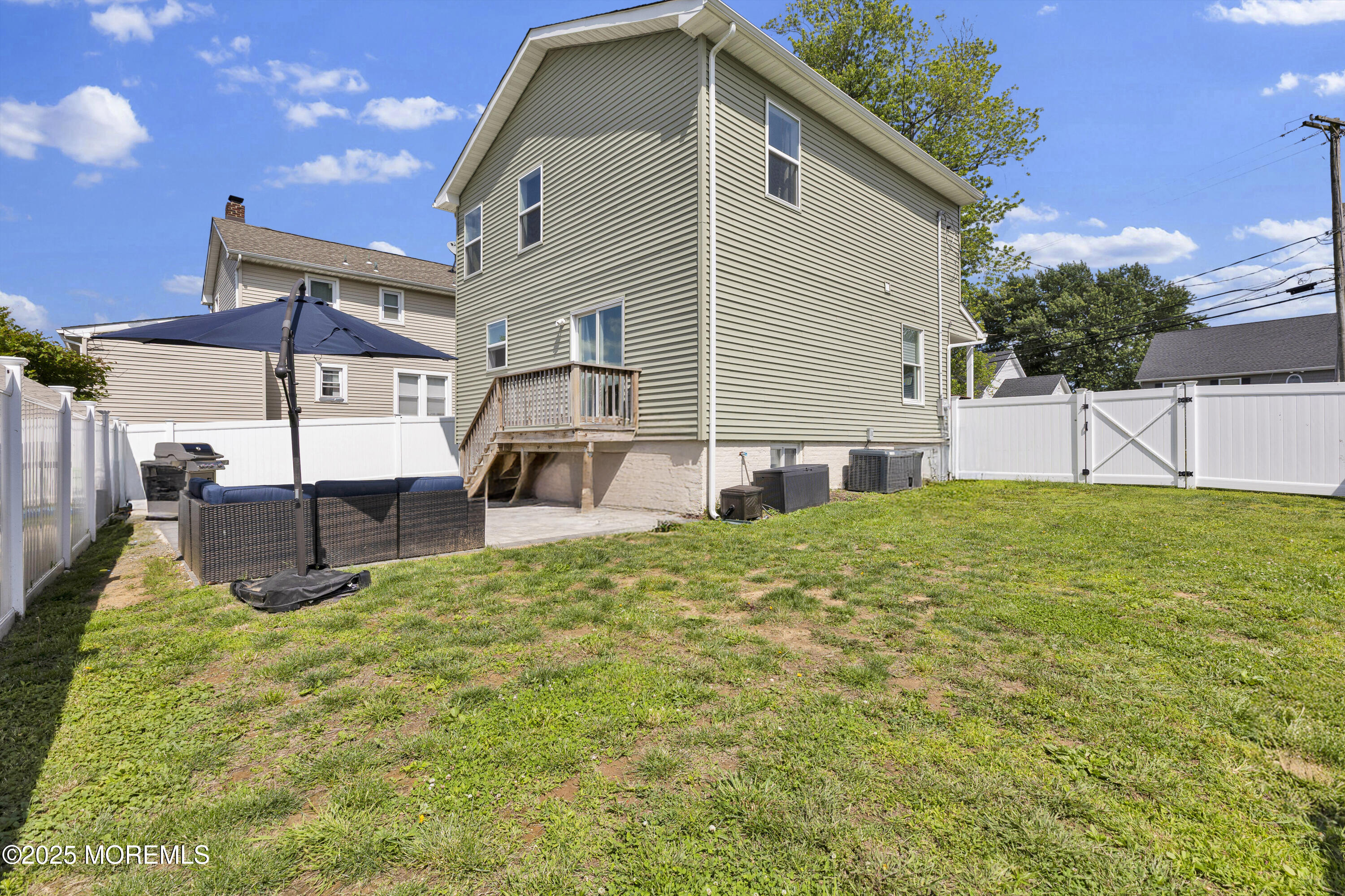 134 County Road Cliffwood, NJ 07721 - Photo 26 of 28 a view of a house with a yard and sitting area