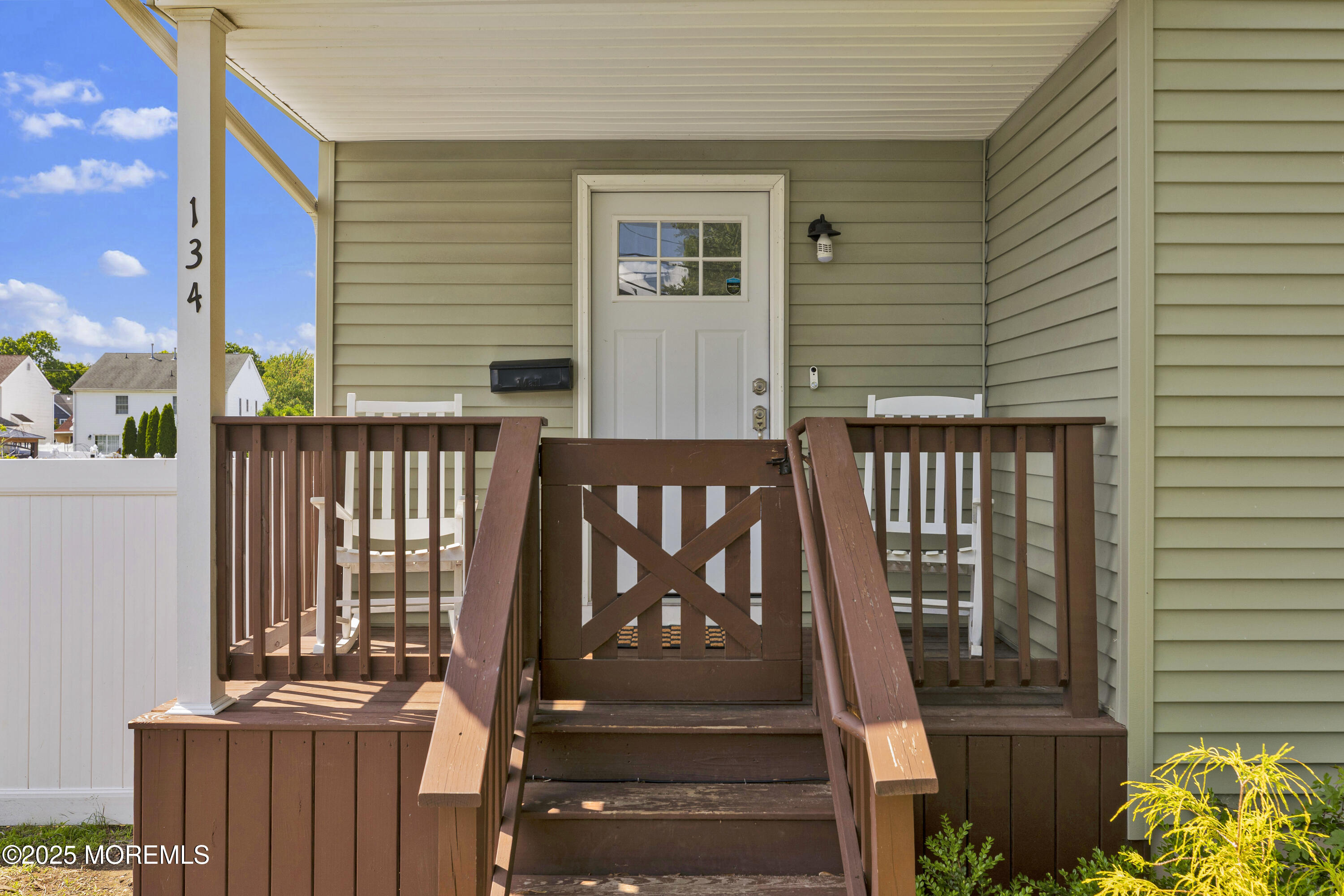 134 County Road Cliffwood, NJ 07721 - Photo 3 of 28 a view of a brick house with a door