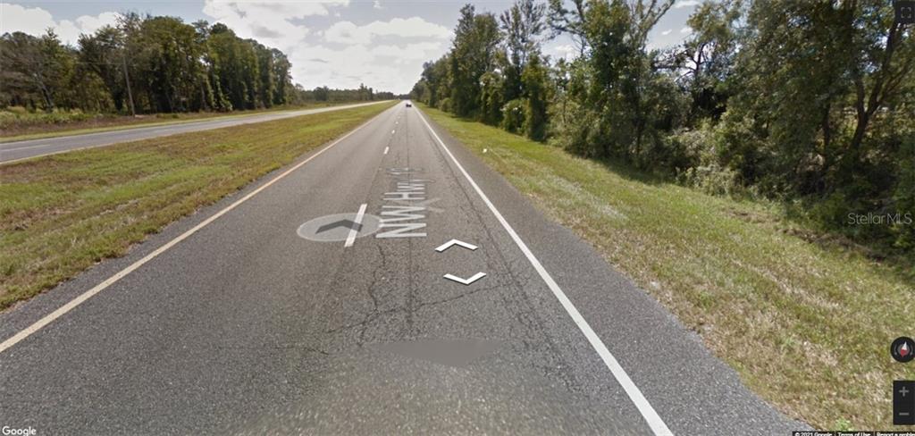 Southwest 316th Avenue Cross City, FL 32628 - Photo 2 of 9 a view of a house with a yard