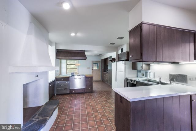 a bathroom with a sink a toilet and a bathtub