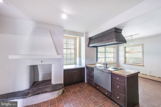 a view of a swimming pool with a yard