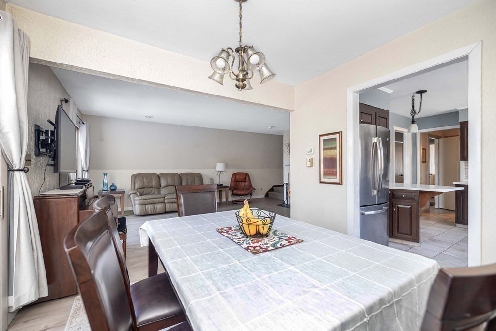 49 Red Bridge Road Wilbraham, MA 01095 - Photo 11 of 40 a view of a dining room with furniture