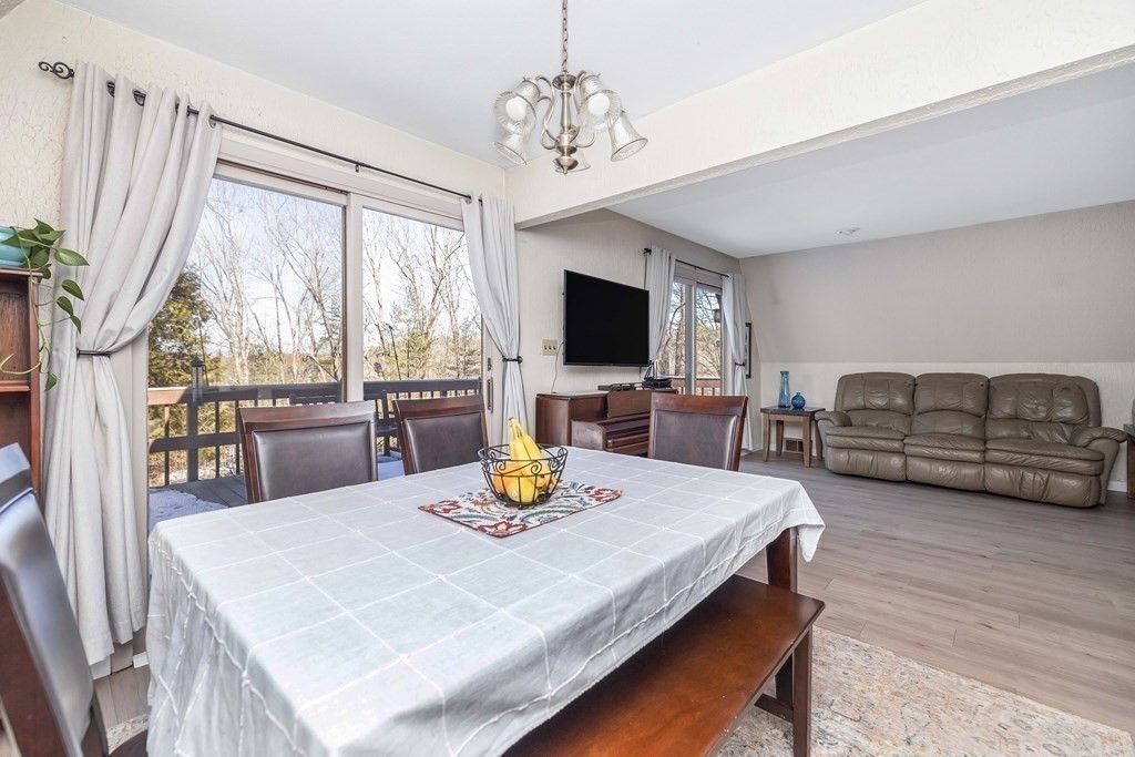 49 Red Bridge Road Wilbraham, MA 01095 - Photo 15 of 40 a view of a dining room with furniture window and wooden floor