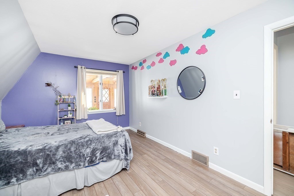 49 Red Bridge Road Wilbraham, MA 01095 - Photo 21 of 40 a bedroom with a bed and a window