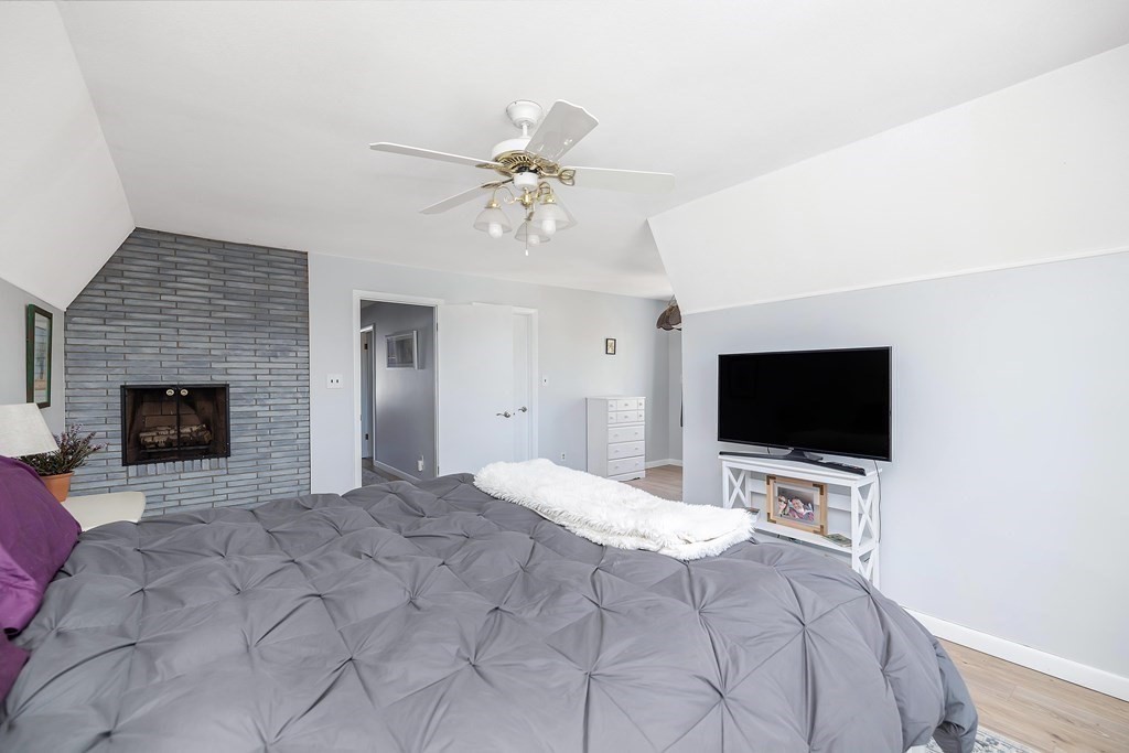 49 Red Bridge Road Wilbraham, MA 01095 - Photo 23 of 40 a bedroom with a bed and a flat screen tv