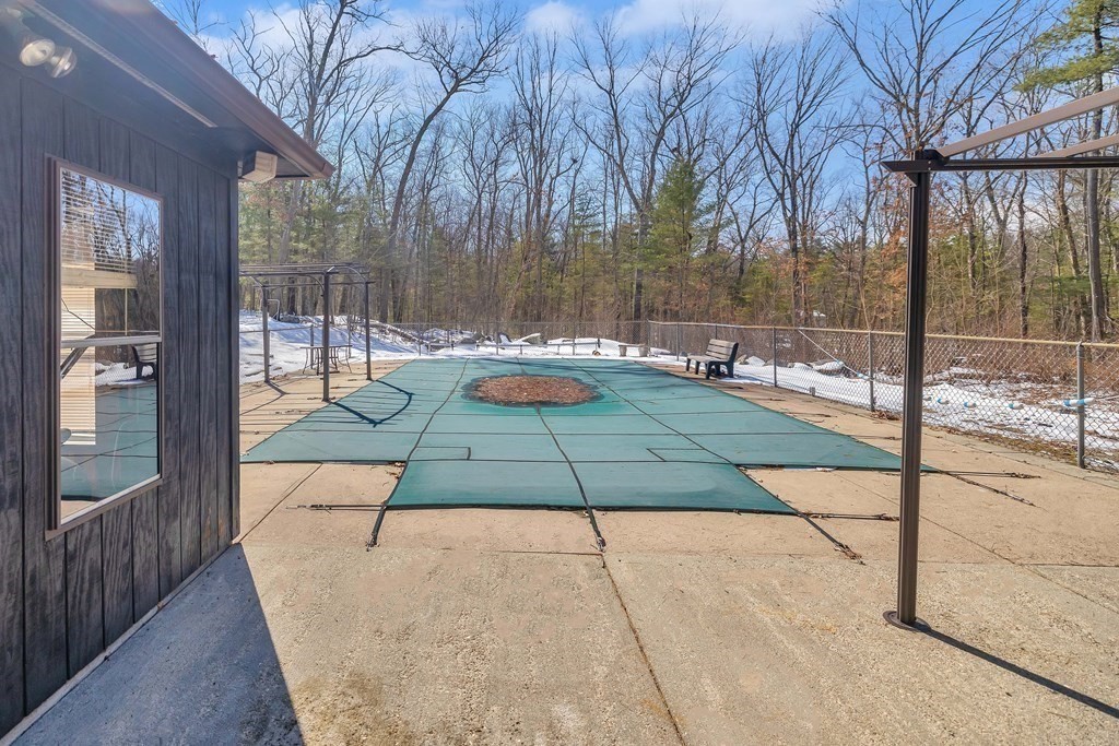 49 Red Bridge Road Wilbraham, MA 01095 - Photo 34 of 40 a view of backyard with swimming pool and seating space