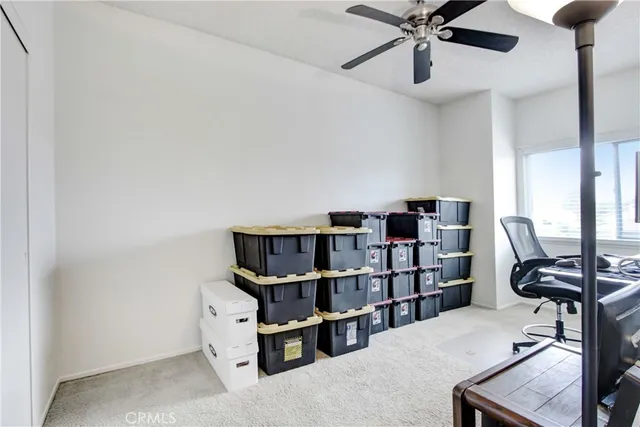 a view of a workspace with furniture