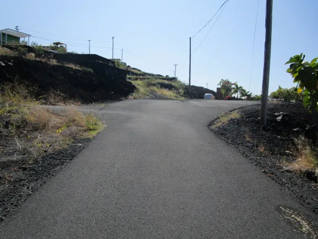 a view of a house with a street