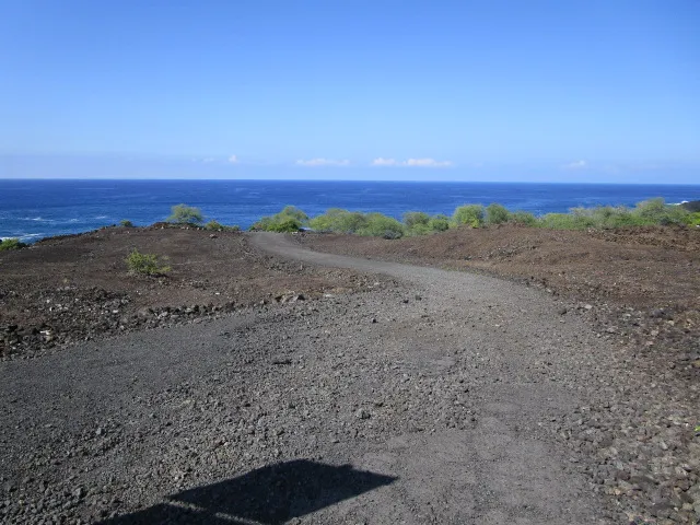 a sign that is on the side of a road
