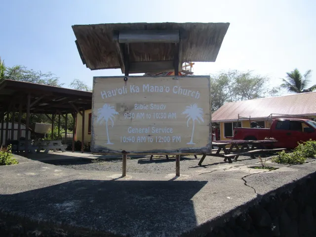a front view of house with yard outdoor seating and barbeque oven
