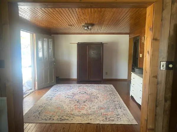 a view of a hallway with a chandelier