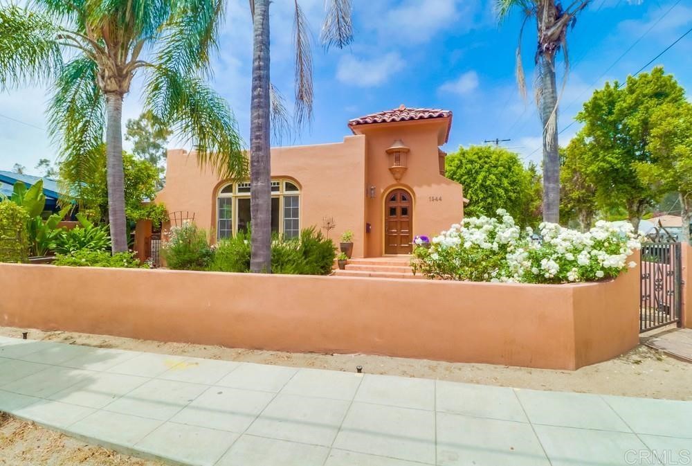 1944 Granada Avenue San Diego, CA 92102 - Photo 2 of 65 front view of a house with a yard and potted plants