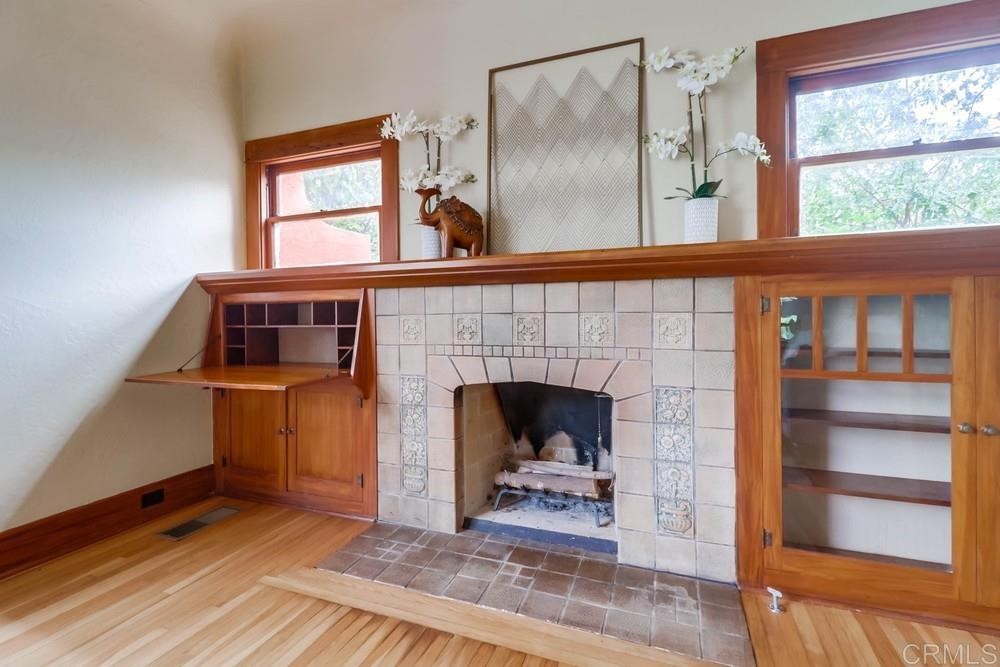 1944 Granada Avenue San Diego, CA 92102 - Photo 16 of 65 a living room with furniture and a fireplace