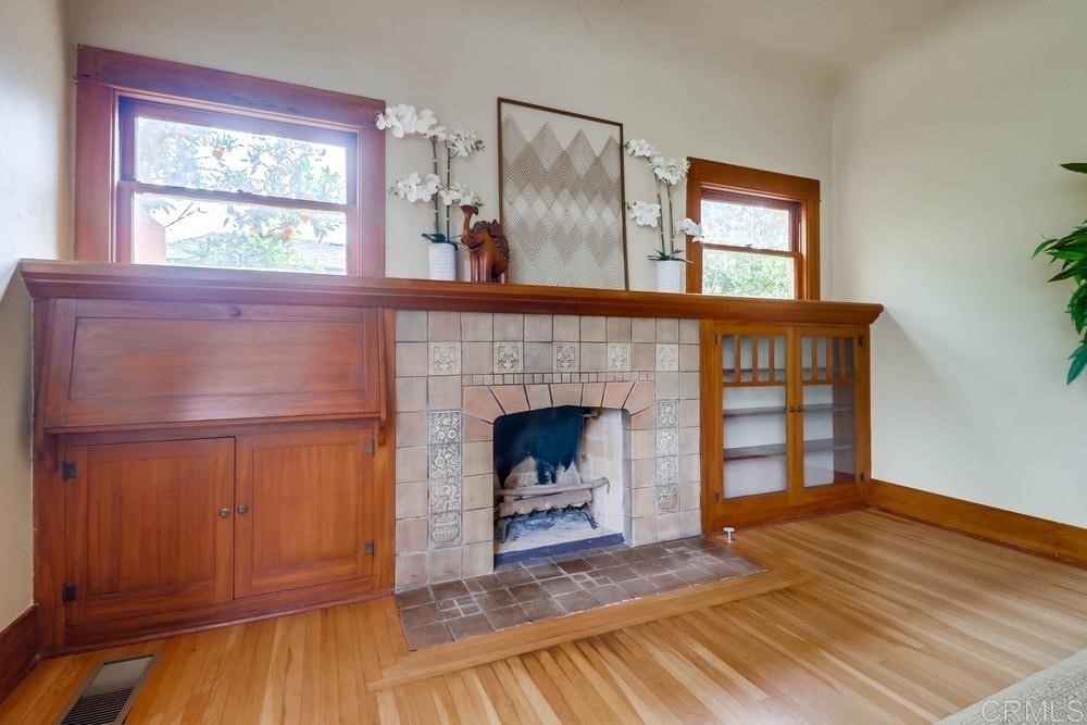 1944 Granada Avenue San Diego, CA 92102 - Photo 17 of 65 a view of a livingroom with a fireplace and window