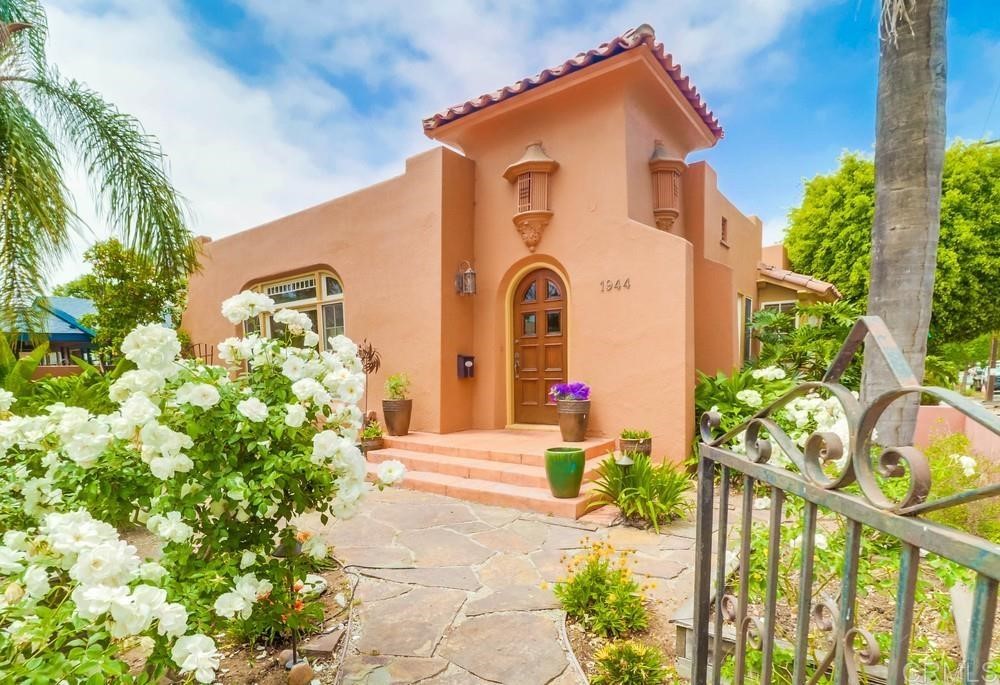 1944 Granada Avenue San Diego, CA 92102 - Photo 3 of 65 a front view of a house with a yard and plant
