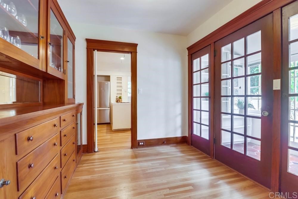 1944 Granada Avenue San Diego, CA 92102 - Photo 30 of 65 a view of empty room with wooden floor and fan