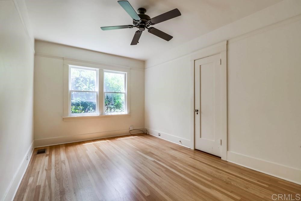 1944 Granada Avenue San Diego, CA 92102 - Photo 42 of 65 wooden floor in an empty room with a window