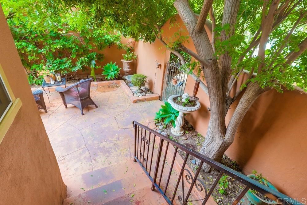 1944 Granada Avenue San Diego, CA 92102 - Photo 58 of 65 a view of balcony with wooden floor and outdoor seating