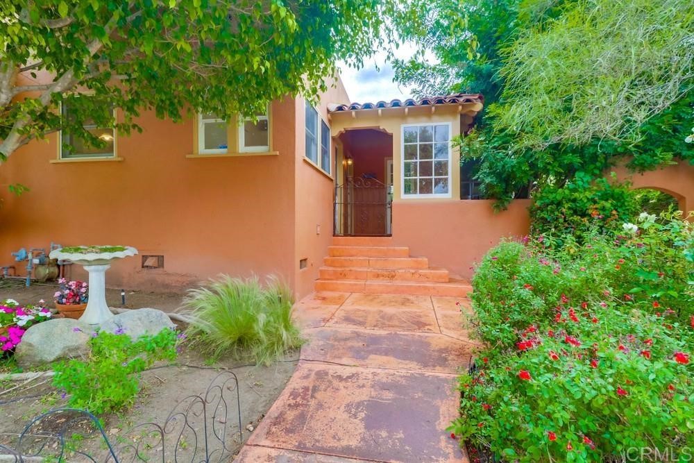 1944 Granada Avenue San Diego, CA 92102 - Photo 59 of 65 a front view of a house with yard