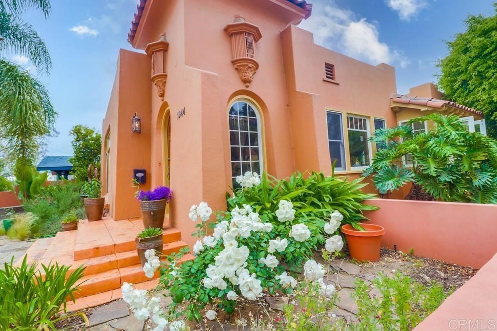 1944 Granada Avenue San Diego, CA 92102 - Photo 8 of 65 a front view of a house with a yard and fountain