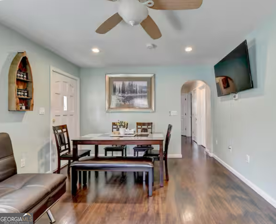 2817 Evergreen Place Gainesville, GA 30501 - Photo 8 of 27 a view of a dining room with furniture and wooden floor