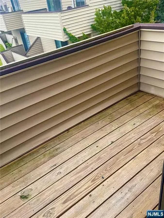 a view of a balcony with a couple of stairs