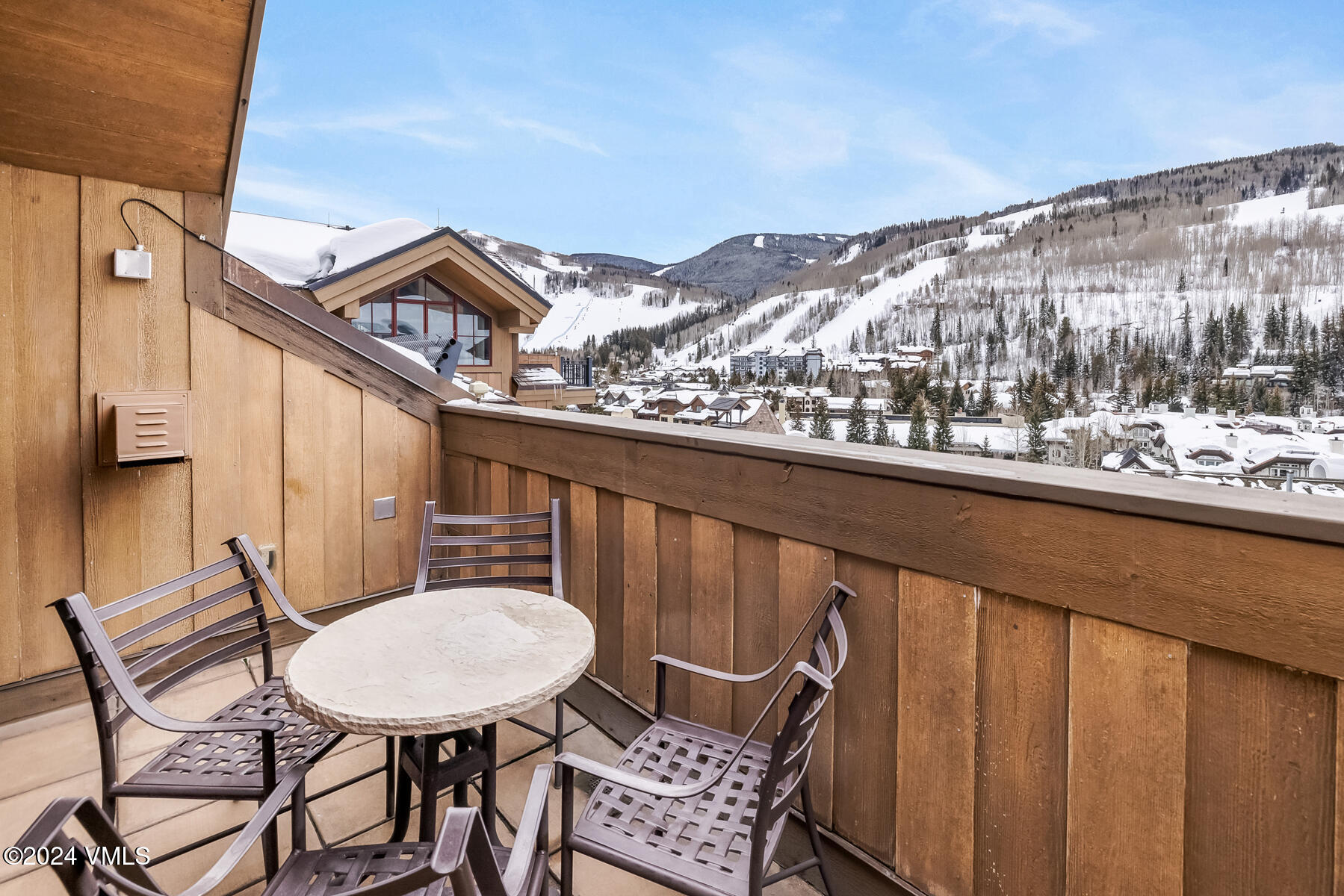 16 Vail Road Vail, CO 81657 - Photo 20 of 36 a balcony view with couple of chairs