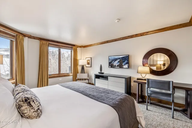 a view of a hallway with washer and dryer