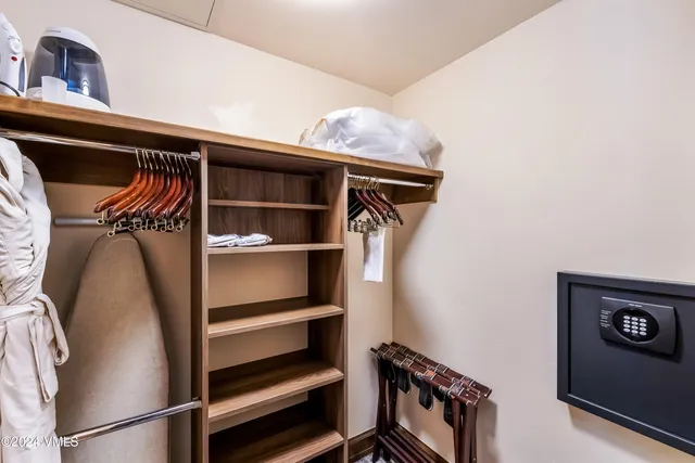 a view of a balcony with a table and chairs