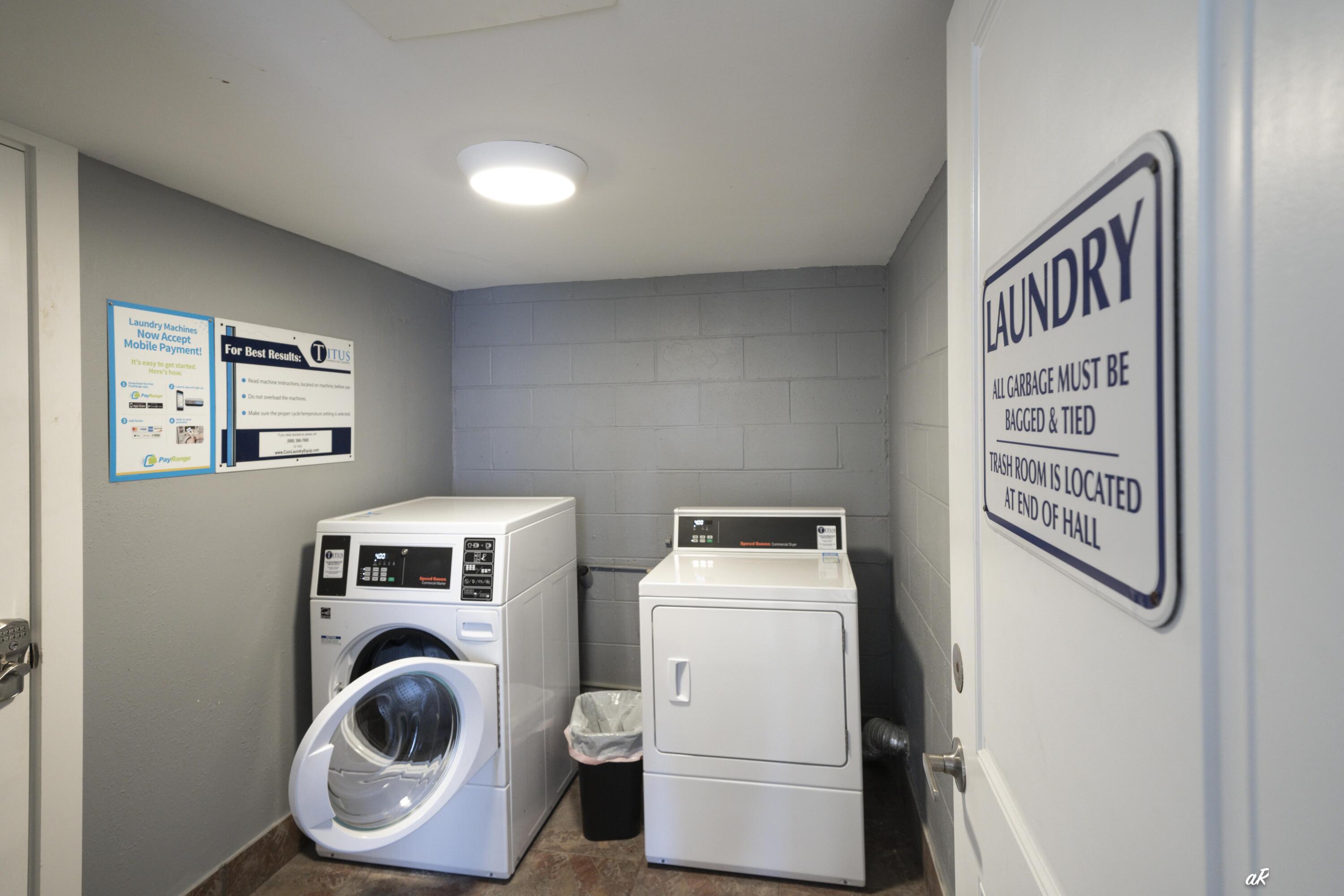 30 Moreno Point Road, Unit 404A Destin, FL 32541 - Photo 27 of 52 a utility room with dryer and washer