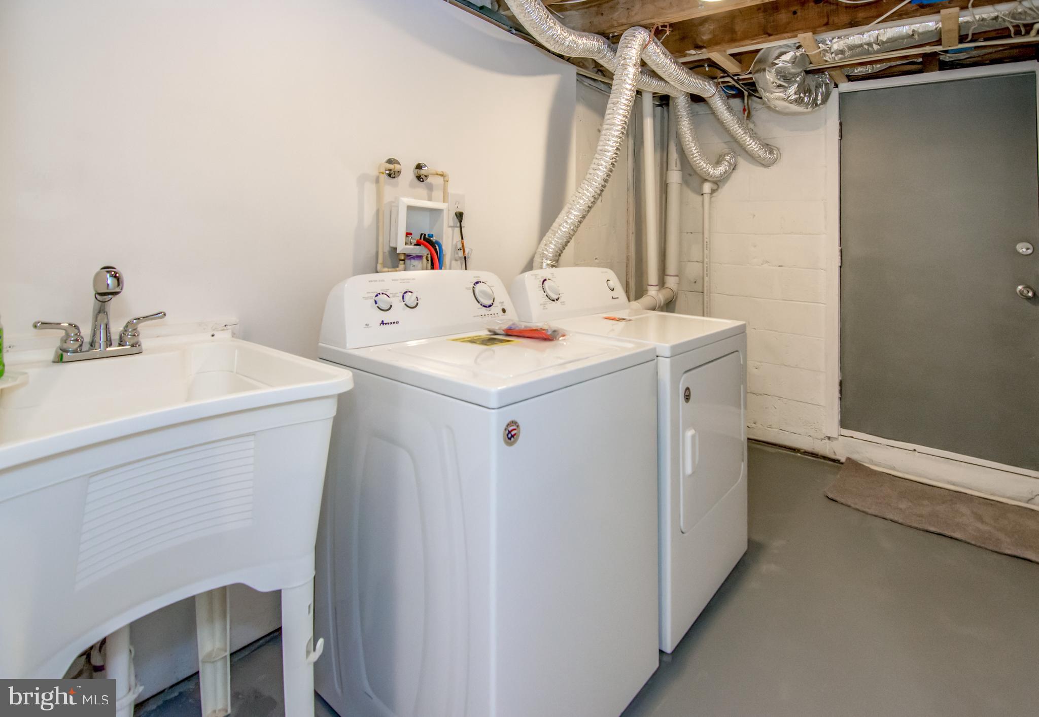 2056 Jasmine Road Dundalk, MD 21222 - Photo 17 of 30 a utility room with dryer and washer