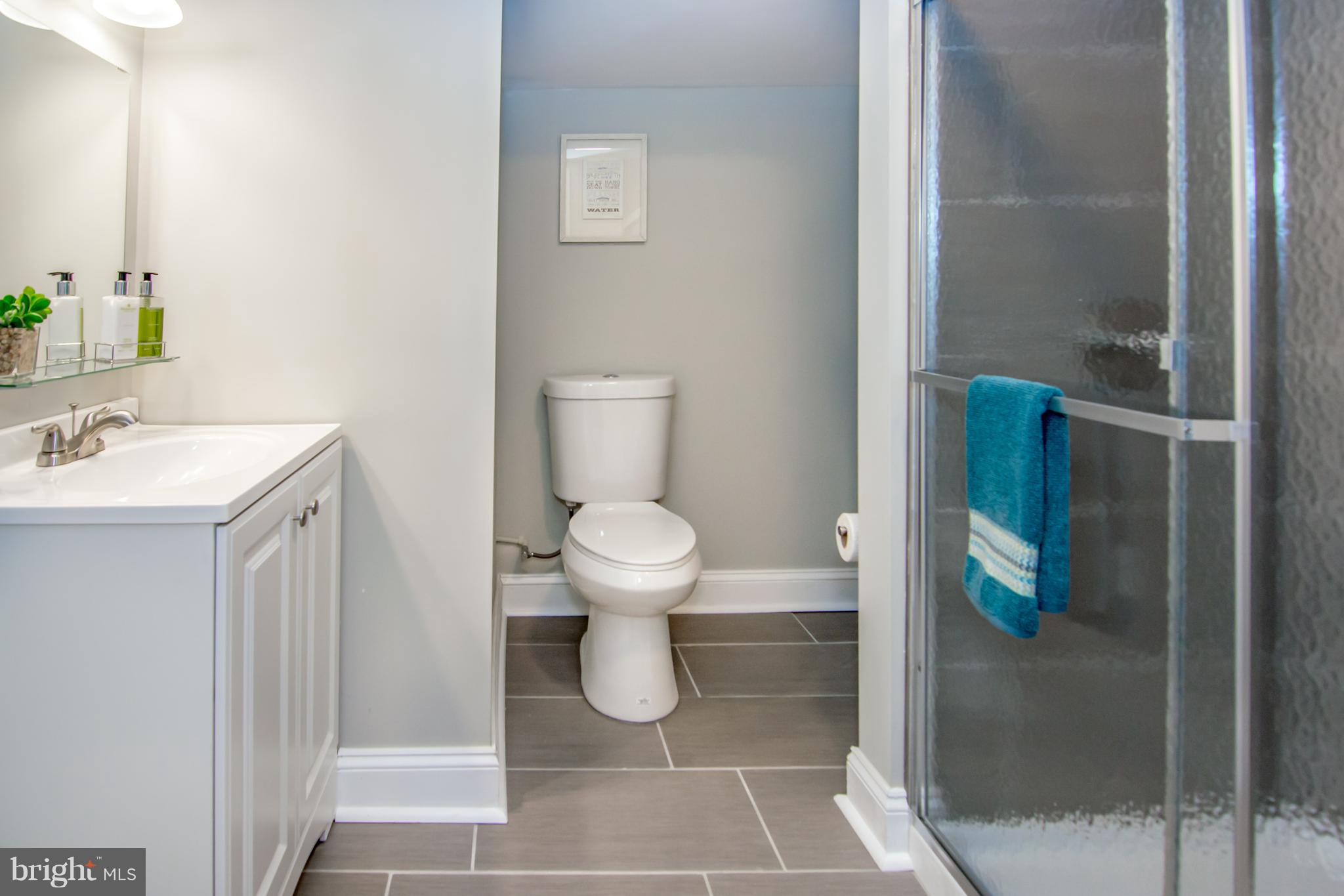 2056 Jasmine Road Dundalk, MD 21222 - Photo 18 of 30 a bathroom with a toilet and a sink