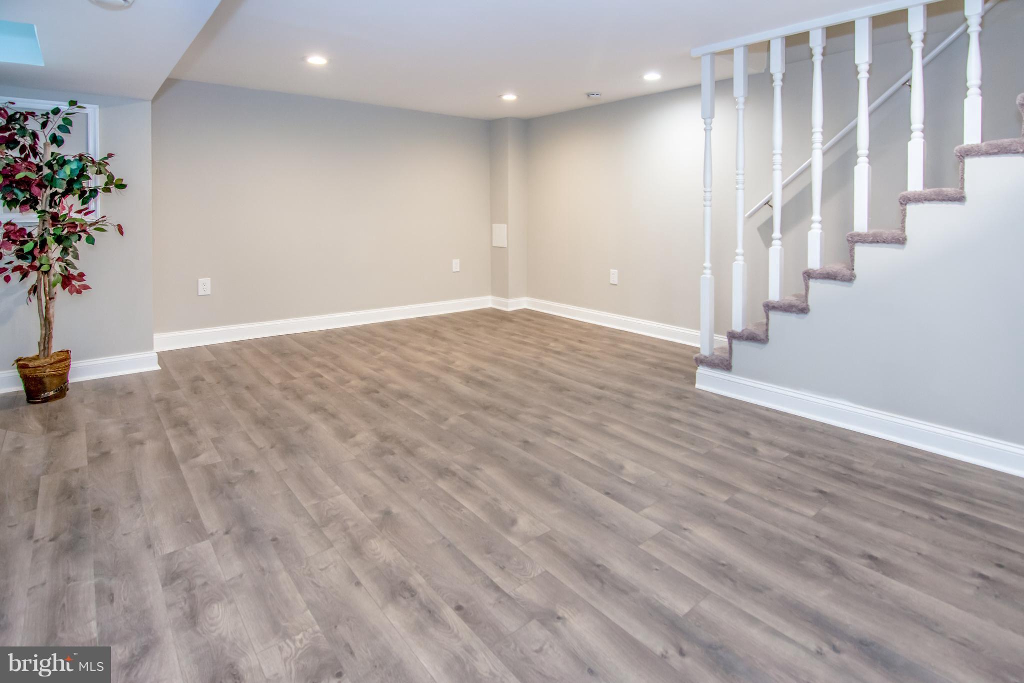 2056 Jasmine Road Dundalk, MD 21222 - Photo 21 of 30 a view of an empty room with stairs