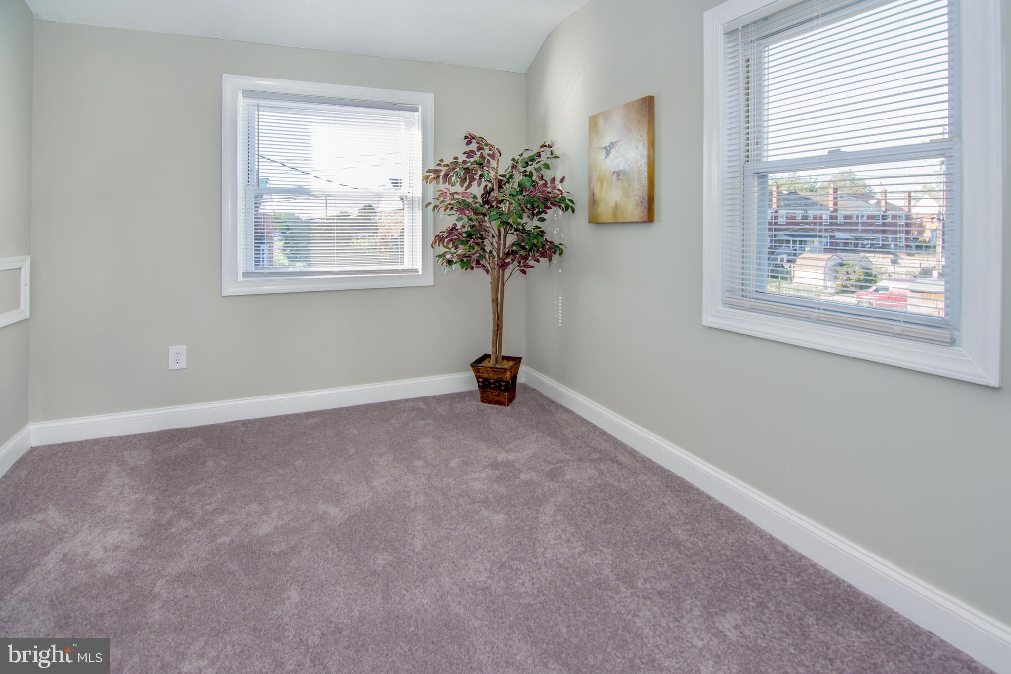 2056 Jasmine Road Dundalk, MD 21222 - Photo 25 of 30 a view of livingroom with window and bathroom